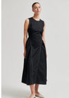 model wearing black sculptured dress