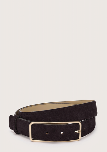 Black belt with a gold buckle on a light gray background from Abro