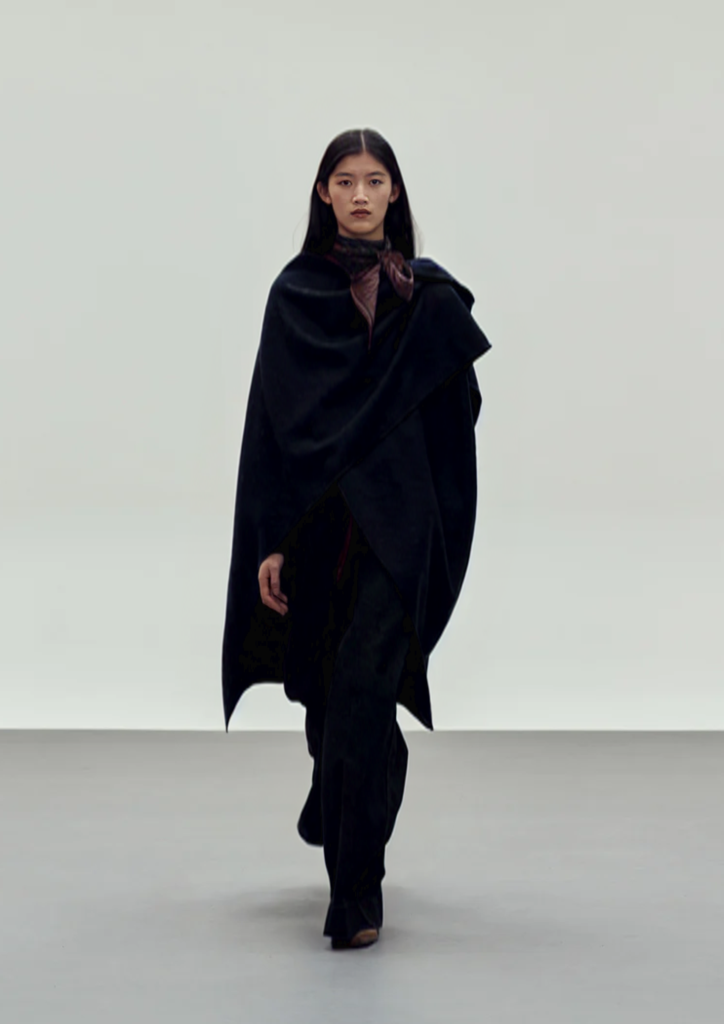 black cape style coat