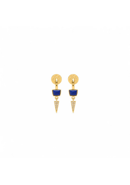 A pair of gold drop earrings featuring a circular stud with a small blue enamel inlay and a dangling chevron-shaped charm paved with clear stones, shown on a plain white background.