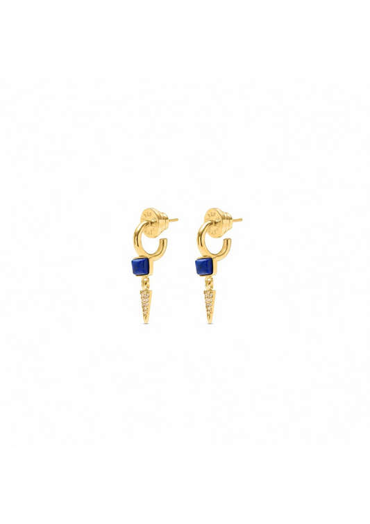 A pair of gold drop earrings featuring a circular stud with a small blue enamel inlay and a dangling chevron-shaped charm paved with clear stones, shown on a plain white background.
