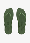 Green flip-flops with 'Sleepers' branding on a white background
