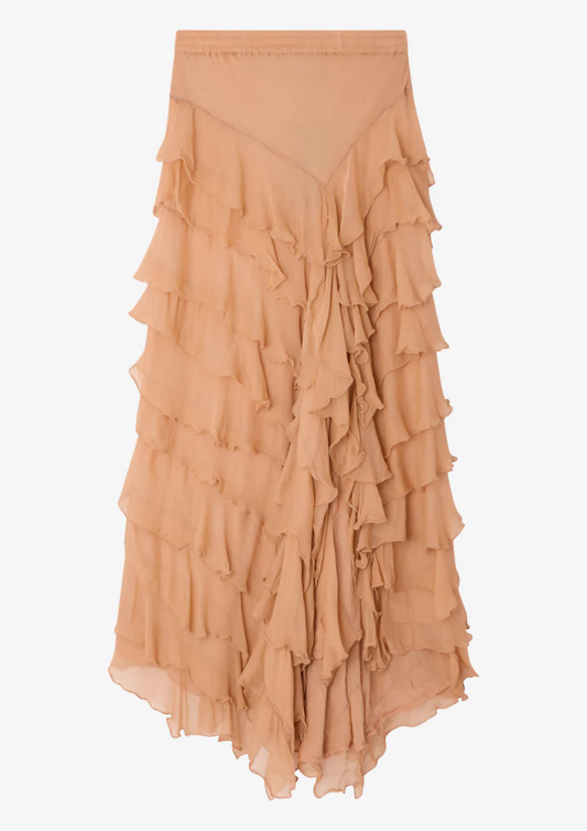 Tiered ruffle skirt in a shade of peach on a light gray background