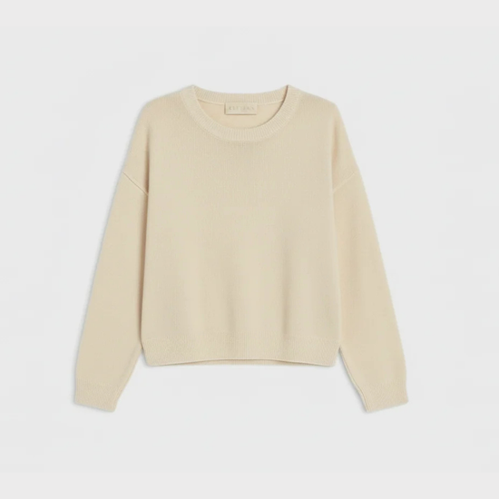 flat lay of beige crew neck jumper