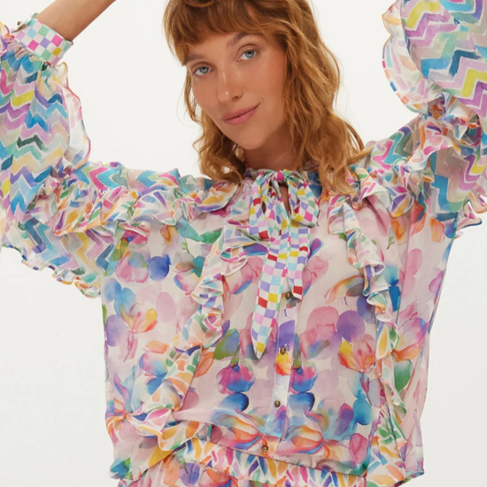 ruffle blouse with tie neck and zig zag colourful print