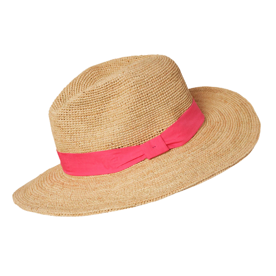 Straw hat with a pink band on a white background