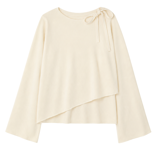 Cream-colored wrap knit with a tie detail on a white background