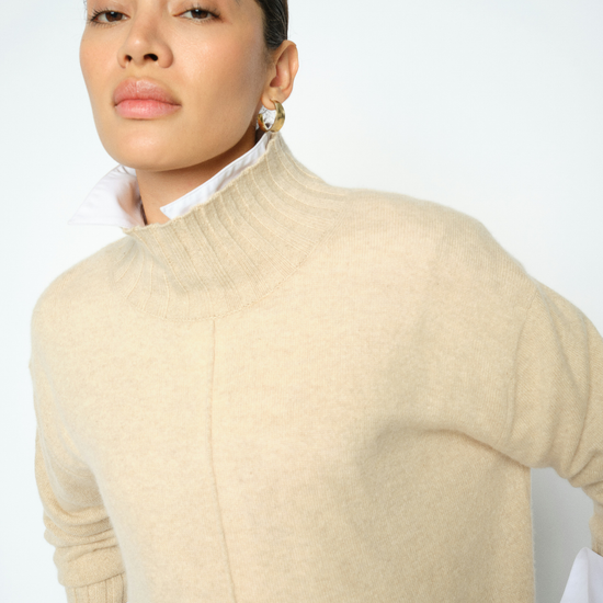 woman wearing high neck jumper close up