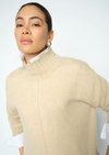 woman wearing high neck jumper close up