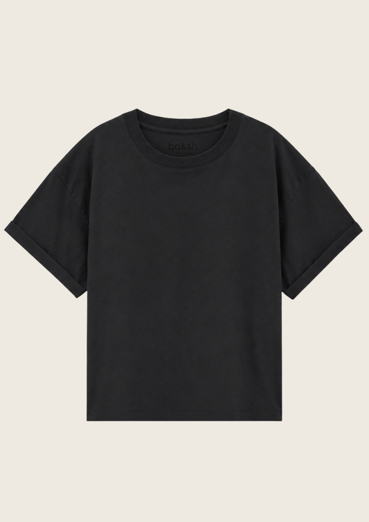 A plain black short-sleeve crewneck t-shirt displayed flat against a light beige background.