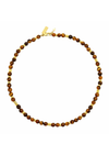 Necklace with brown beads and gold accents on a white background