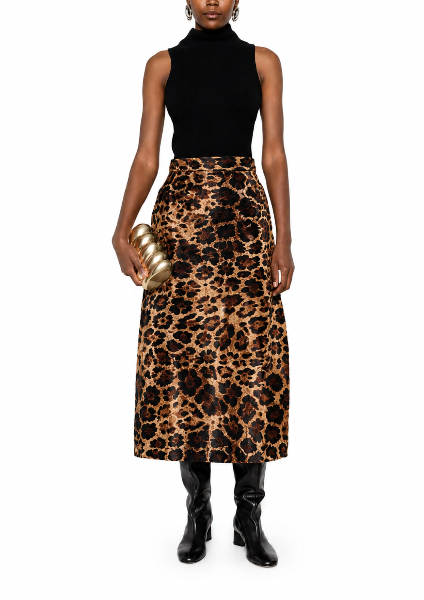 A model wearing a sleeveless black mock-neck top and a high-waisted leopard-print midi skirt, holding a gold metallic clutch, set against a plain white background.