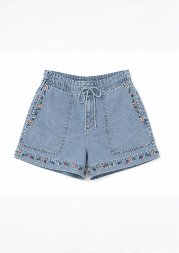 Blue denim shorts with floral embroidery on a white background