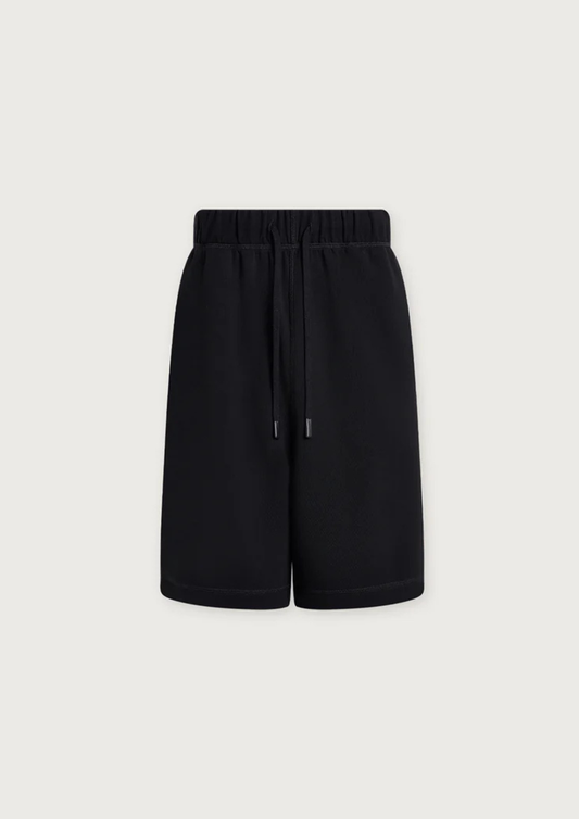 Black shorts on a light gray background