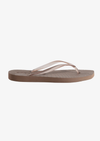 sand coloured flip flop product shot on a white background