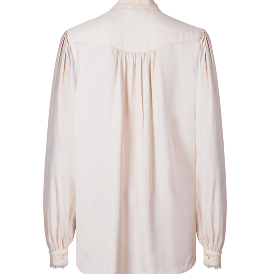 pink blouse on a white background rear view