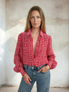 Ditsy print shirt with balloon sleeves worn with blue denim from Sirens