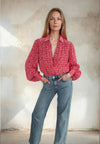 Ditsy print shirt with balloon sleeves worn with blue denim from Sirens
