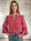 Ditsy print shirt with balloon sleeves worn with blue denim from Sirens