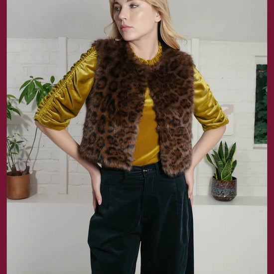 chocolate brown leopard print faux fur gilet with round neck and hook closure model shot