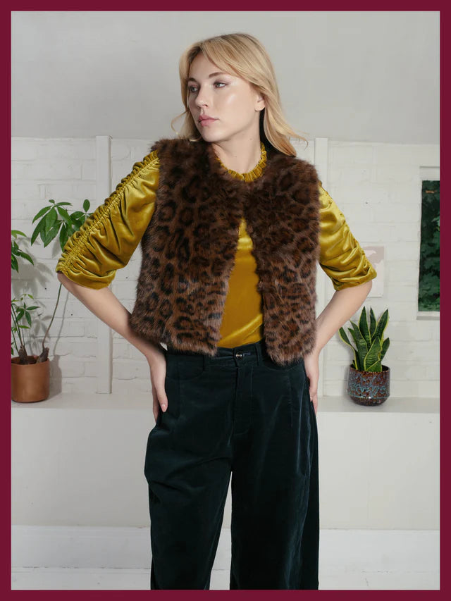 chocolate brown leopard print faux fur gilet with round neck and hook closure model shot