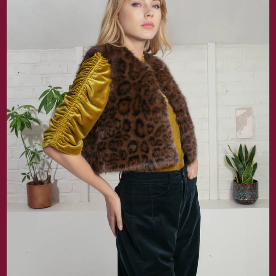chocolate brown leopard print faux fur gilet with round neck and hook closure model shot