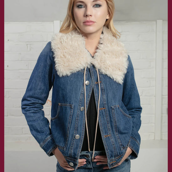 Denim jacket worn with faux fur collar