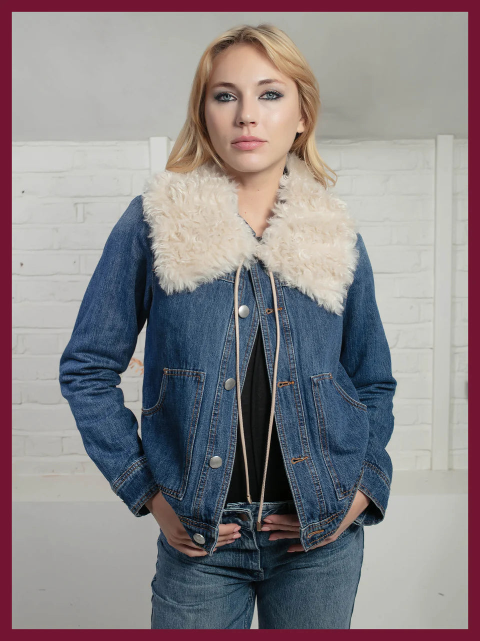 Denim jacket worn with faux fur collar