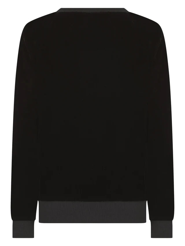 Black velvet sweatshirt with gold stripe down the arms and ribbed collar cuffs and hem