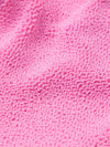Close-up of pink textured fabric