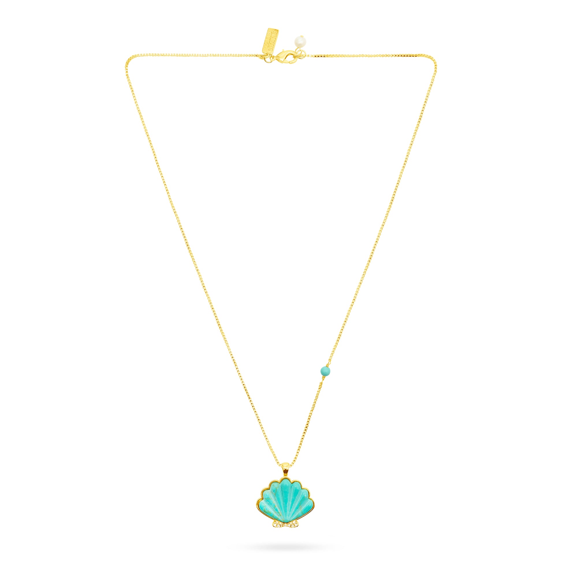 Gold necklace with a turquoise shell pendant on a white background