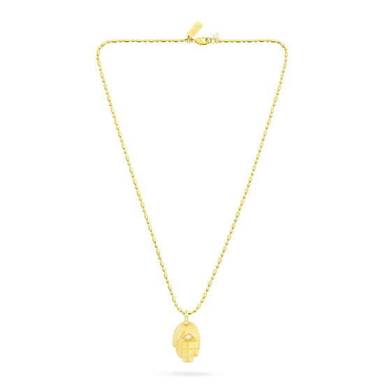 Gold necklace with a pendant on a white background from Talis Chains