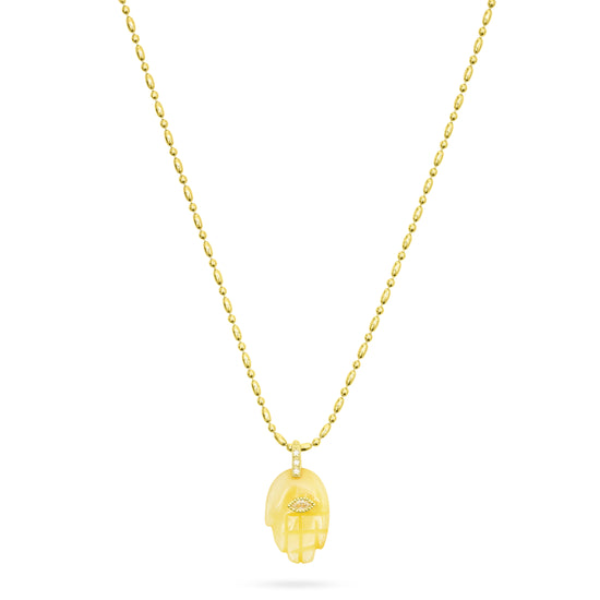 Gold necklace with a unique pendant on a white background from Talis Chains