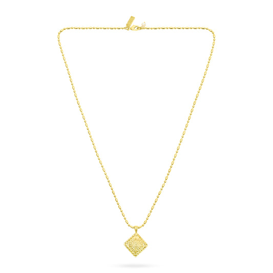 Gold necklace with a diamond-shaped pendant on a white background