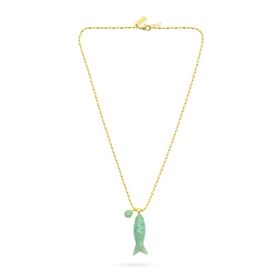 Gold necklace with a green pendant on a white background