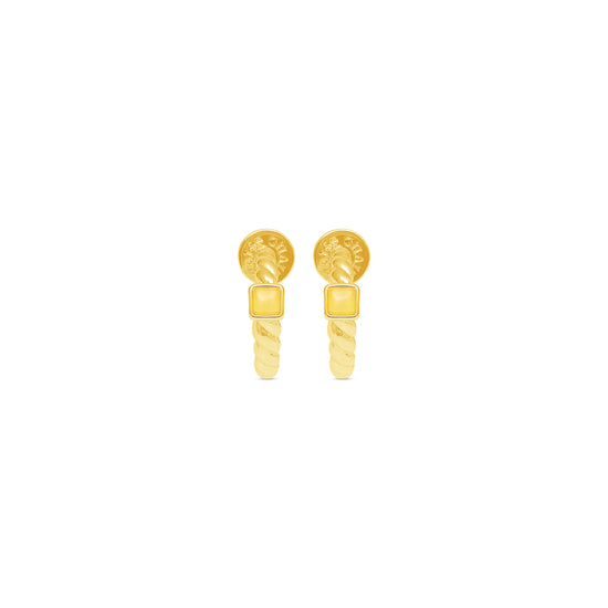 Gold hoop shaped earrings with yellow jade stone details on a white background