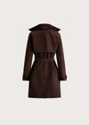 A dark brown trench coat with a matching waist belt, shown from the back against a light beige background.