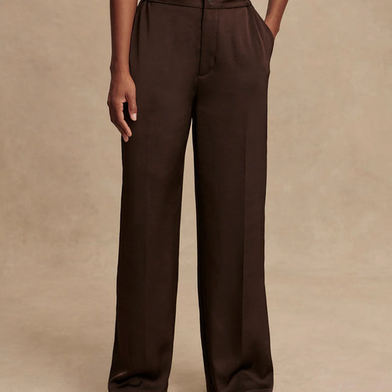 wide leg elasticated waist chocolate brown sateen trousers model shot