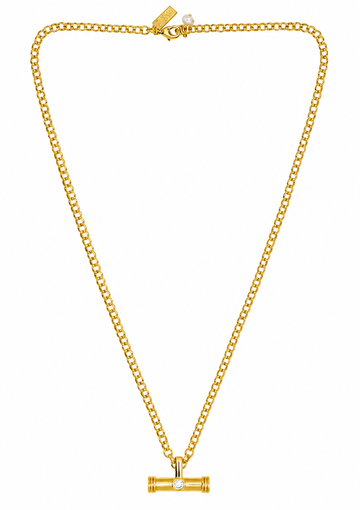 A gold chain necklace with a cylindrical pendant featuring a central clear gemstone, displayed on a solid white background.