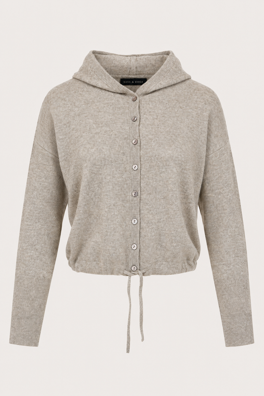 flat kay of a hooded cropped knit in a light brown colour with buttons through the front, and a drawstring at the hem