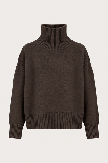 A dark brown ribbed-knit turtleneck sweater with dropped shoulders, displayed on a clean, light off-white background.