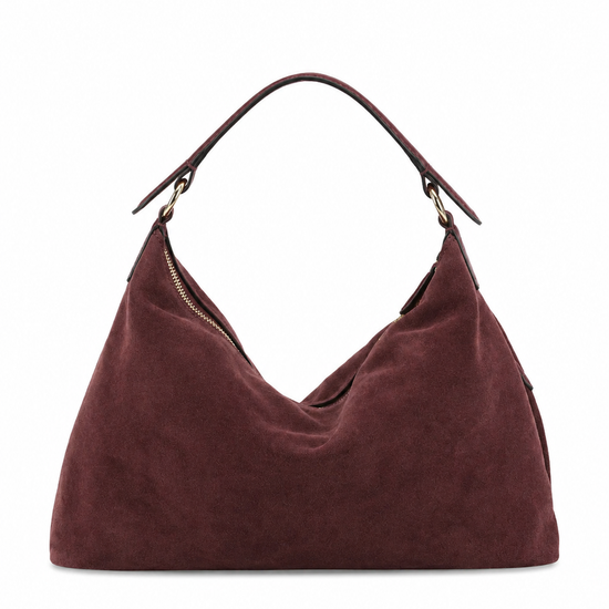 A slouchy hobo shoulder bag in dark burgundy suede, featuring a single top handle and a zippered main compartment, shown against a plain white background.