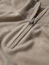 beige quarter zip knit with contrast stripe cuff close up
