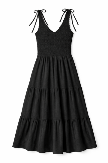 Black tiered maxi dress with smocked bodice, ruffled V-neckline and shoulder ties in lightweight fabric.