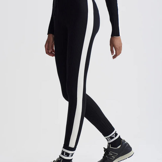 black ribbed leggings with white stripe on side side view 