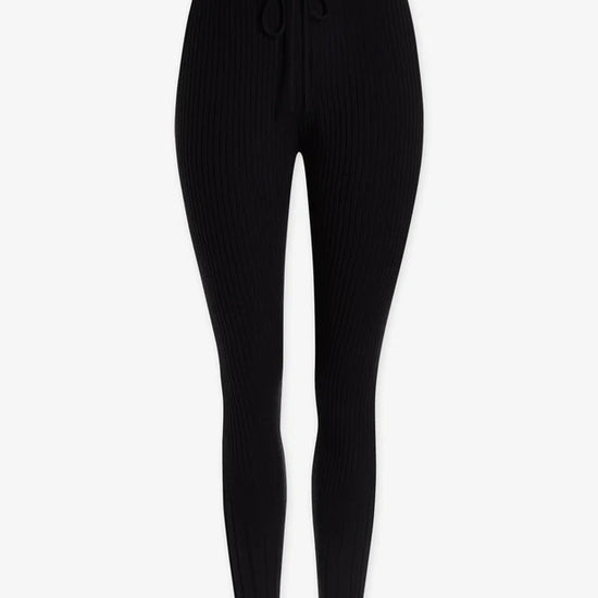 black ribbed leggings with white stripe on side 