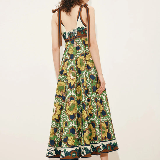 Rear view of linen dress on model from Alemais