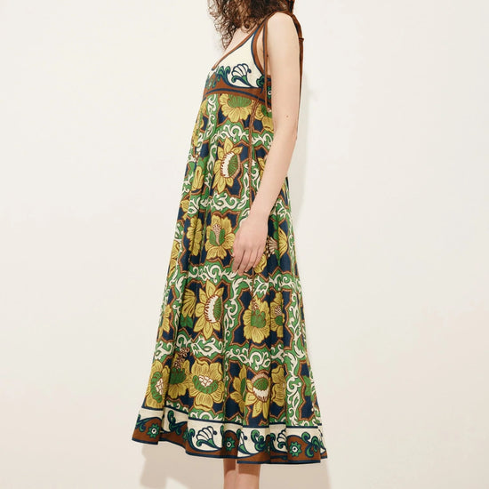Side view of printed linen sun dress from Alemais