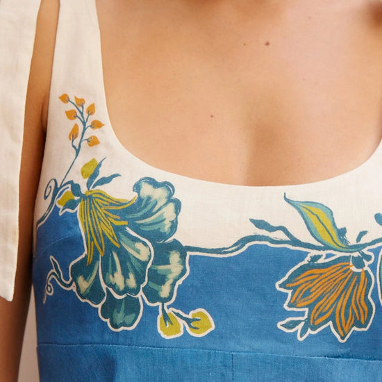tie strap midi dress with blue and cream flora print from alemais close up