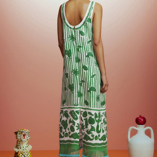 Sleeveless green printed sun dress with fringe detail on the hem rear view 